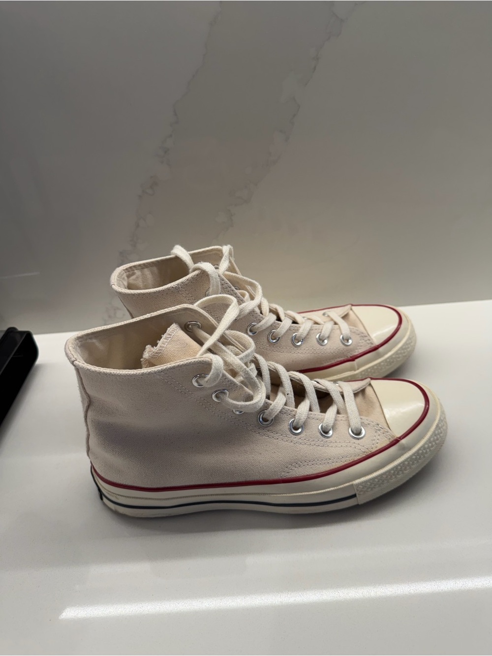 Converse High Top Sneakers in Cream with Red and Black Stripe